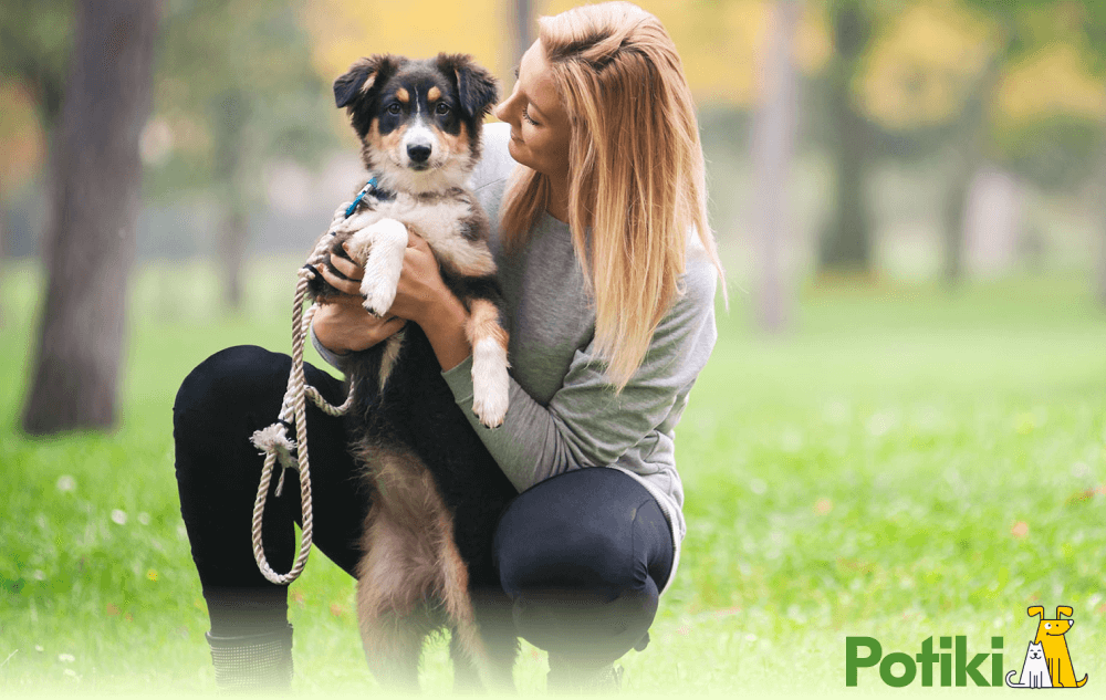 Best Pet Insurance - Women hugging dog outside